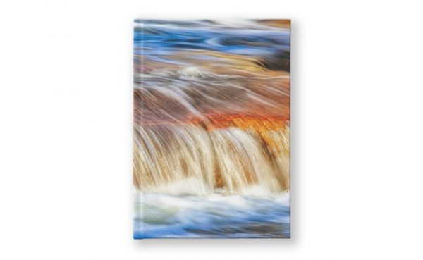 Ebb and Flow, Noble Falls Hardcover Journal design by Dave Catley featuring Noble Falls winter water flow available from our MADCAT.RedBubble.com store.