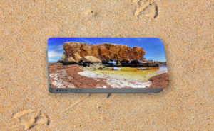 The Guardian, Two Rocks Portable Battery Charger design by Dave Catley featuring The larger of the 2 rocks that gave Two Rocks its name. available from our Dave Catley pixels.com store.